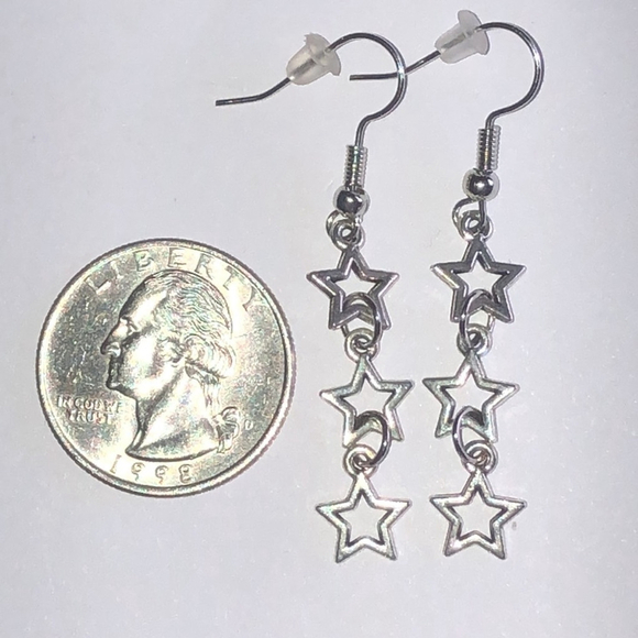Silver Tone Star Dangle Earrings - Picture 2 of 3